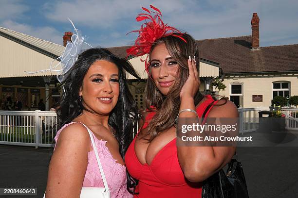 Fashion on Ladies Day at Aintree Racecourse on April 04, 2025 in Liverpool, England.