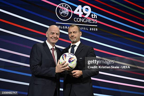 President Gianni Infantino and UEFA President Aleksander Ceferin pose for a photo with the UEFA Women's Euro match ball during the 49th Ordinary UEFA...