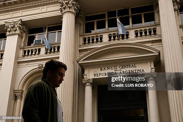 Man walks past Argentina's Central Bank in Buenos Aires on April 7, 2025.