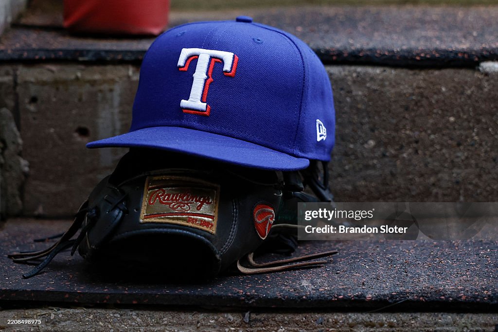 Ravens Head Reds Rangers A detail of the Texas Rangers logo on a hat in the dugout prior to a ...