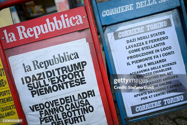 Italian Newspaper headlines regarding the new international trade tariffs imposed by US President Donald Trump seen on a newstand on April 4, 2025 in...