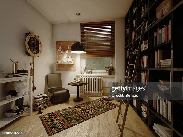 cozy library nook with retro-modern charm - home library stock pictures, royalty-free photos & images