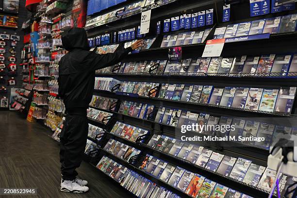 People shop at a Gamestop store in Union Square on April 04, 2025 in New York City. Shares of GameStop Corp. Rose 1.7% after Chief Executive Ryan...