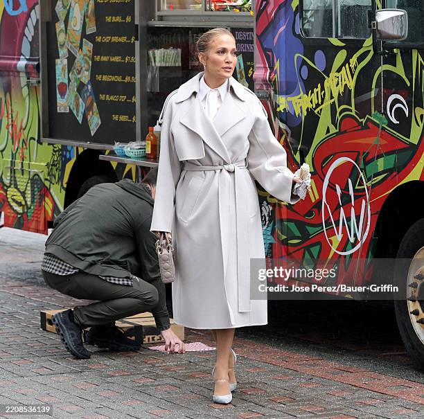 Jennifer Lopez filming is seen on the "Office Romance" movie set on April 07, 2025 in Hoboken, New Jersey.