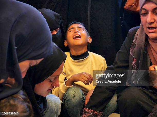Boy mourns the loss of Palestinian journalist Ahmed Mansour of the news outlet Palestine Today during the funeral ceremony in Khan Yunis, Gaza, on...