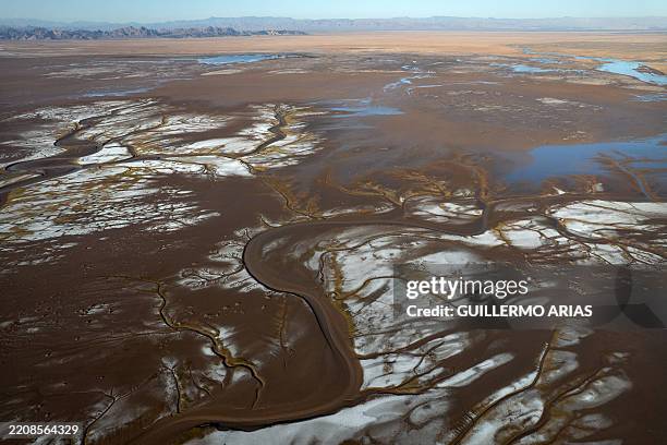 Aerial view of the Colorado river delta meeting the Cortes Sea at Valle de Mexicali, Baja California state, Mexico, on April 4, 2025. In a...