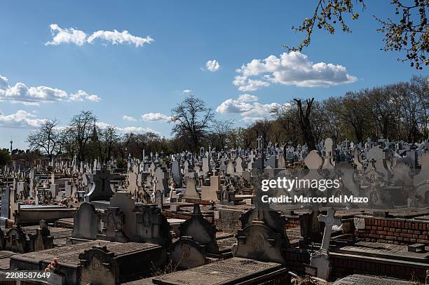 Crucifixes on the graves of the cemetery of Nuestra Señora de la Almudena, the main cemetery of the Spanish capital, with an area of 120 hectares, it...