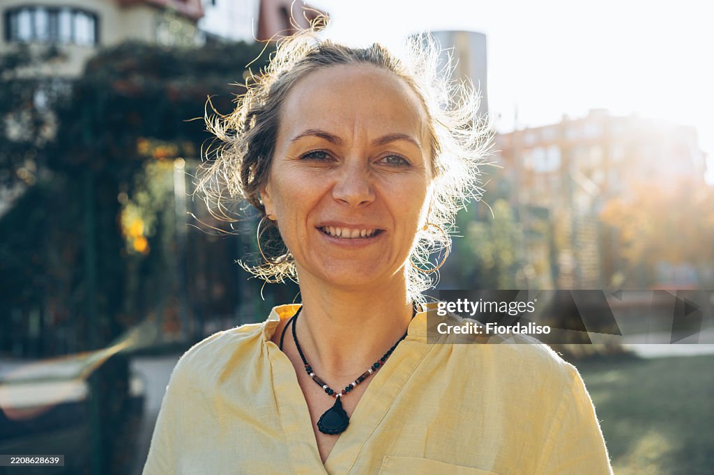 Portrait of a woman in yellow blouse