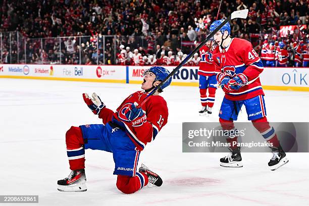 Cole Caufield of the Montreal Canadiens celebrates his goal during the second period against the Detroit Red Wings at the Bell Centre on April 8,...