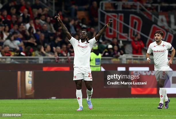 Moise Kean of Fiorentina celebrates scoring his team's second goal during the Serie A match between AC Milan and Fiorentina at Stadio Giuseppe Meazza...