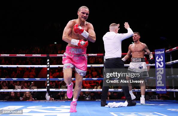 Michael Rafferty Boxer Jack Rafferty celebrates victory as Cory O'Regan reacts to defeat ...