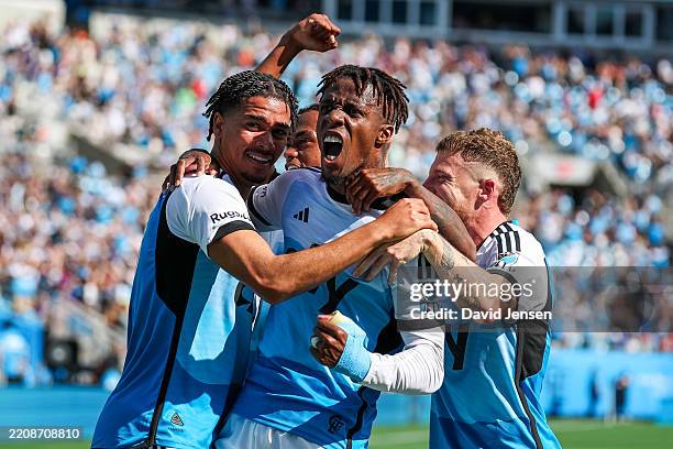 Wilfried Zaha celebrates after a Idan Toklomati of Charlotte FC goal during the second half of a soccer match against the Nashville SC at Bank of...