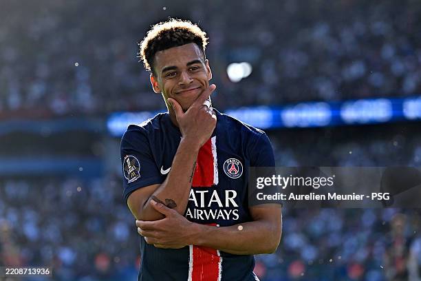 Desire Doue of Paris Saint-Germain reacts after scoring during the Ligue 1 match between Paris Saint-Germain FC and Angers SCO at Parc Des Princes on...