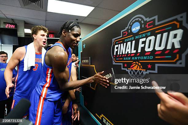 The Florida Gators celebrate a win in the Final Four Game of the NCAA Men's Basketball Tournament at Alamodome on April 05, 2025 in San Antonio,...
