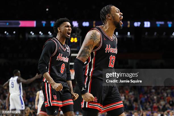 Wan Roberts and Mylik Wilson of the Houston Cougars react during the second half in the Final Four game of the NCAA Men's Basketball Tournament...
