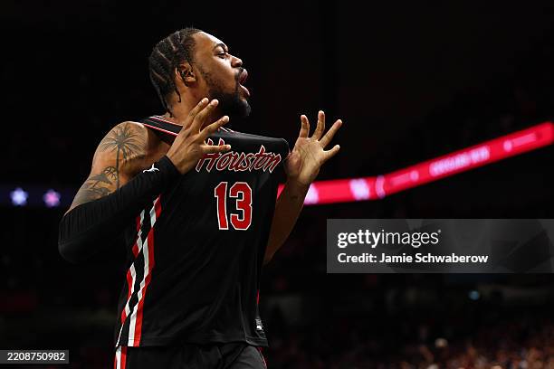 Wan Roberts of the Houston Cougars celebrates in the Final Four Game of the NCAA Men's Basketball Tournament at Alamodome on April 05, 2025 in San...