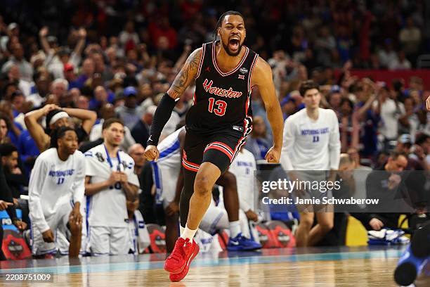 Wan Roberts of the Houston Cougars celebrates in the Final Four Game of the NCAA Men's Basketball Tournament at Alamodome on April 05, 2025 in San...