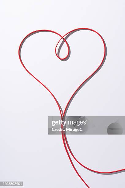 Heartstring Rope Shape 278 Red String With Heart Shape Stock Photos, High-Res Pictures, and ...