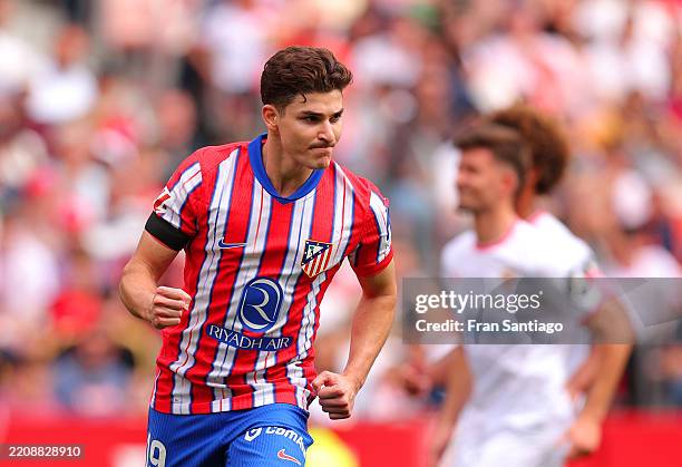 Julian Alvarez of Atletico de Madrid celebrates scoring his team's first goal during the LaLiga match between Sevilla FC and Atletico de Madrid at...