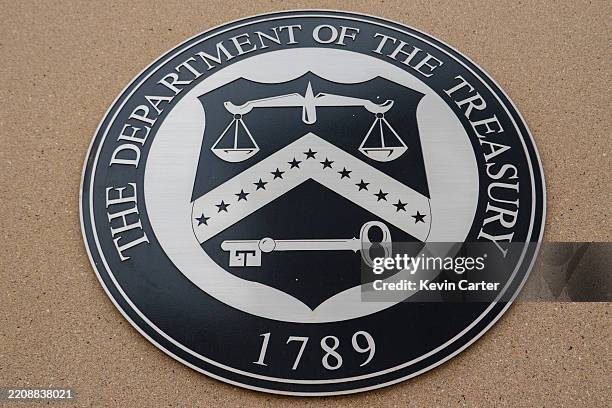 Department of the Treasury sign is displayed outside the Denver Mint, a branch of the United States Mint on March 20, 2025 in Denver, Colorado.