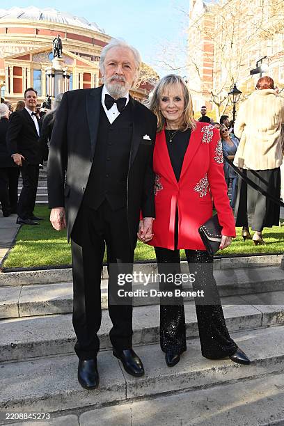 Leigh Lawson and Twiggy aka Dame Lesley Lawson attend The Olivier Awards 2025 with Mastercard at The Royal Albert Hall on April 6, 2025 in London,...