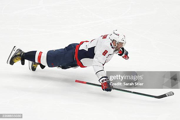 Alex Ovechkin of the Washington Capitals celebrates after scoring his 895th career goal during the second period against the New York Islanders to...