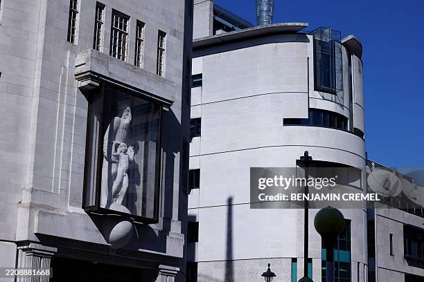 The renovated sculpture of Prospero and Ariel from William Shakespeare's play The Tempest by British sculpor Eric Gill is seen behind a protective...