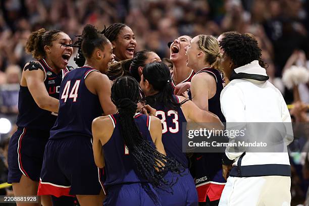 The UConn Huskies celebrate after beating the South Carolina Gamecocks 82-59 to win the National Championship of the NCAA Women's Basketball...