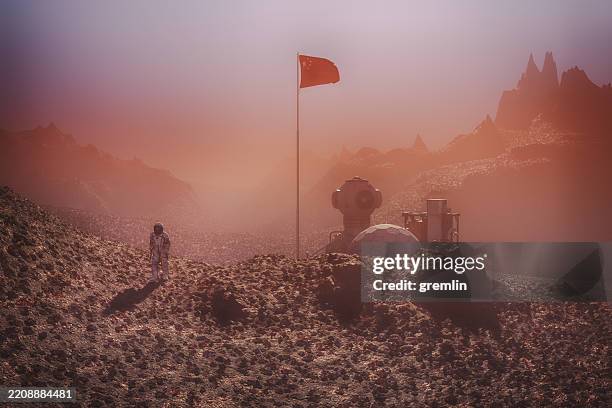 chinese astronaut on exo planet surface - extrasolar planet stock pictures, royalty-free photos & images