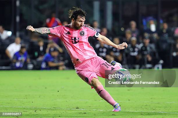 Lionel Messi of Inter Miami CF scores the team's first goal during the MLS match between Inter Miami CF and Toronto FC at Chase Stadium on April 06,...