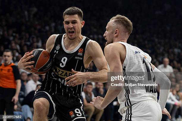 Vanja Marinkovic, #9 of Partizan Mozzart Bet Belgrade in action against Dzanan Musa, #13 of Real Madrid during the Turkish Airlines EuroLeague...