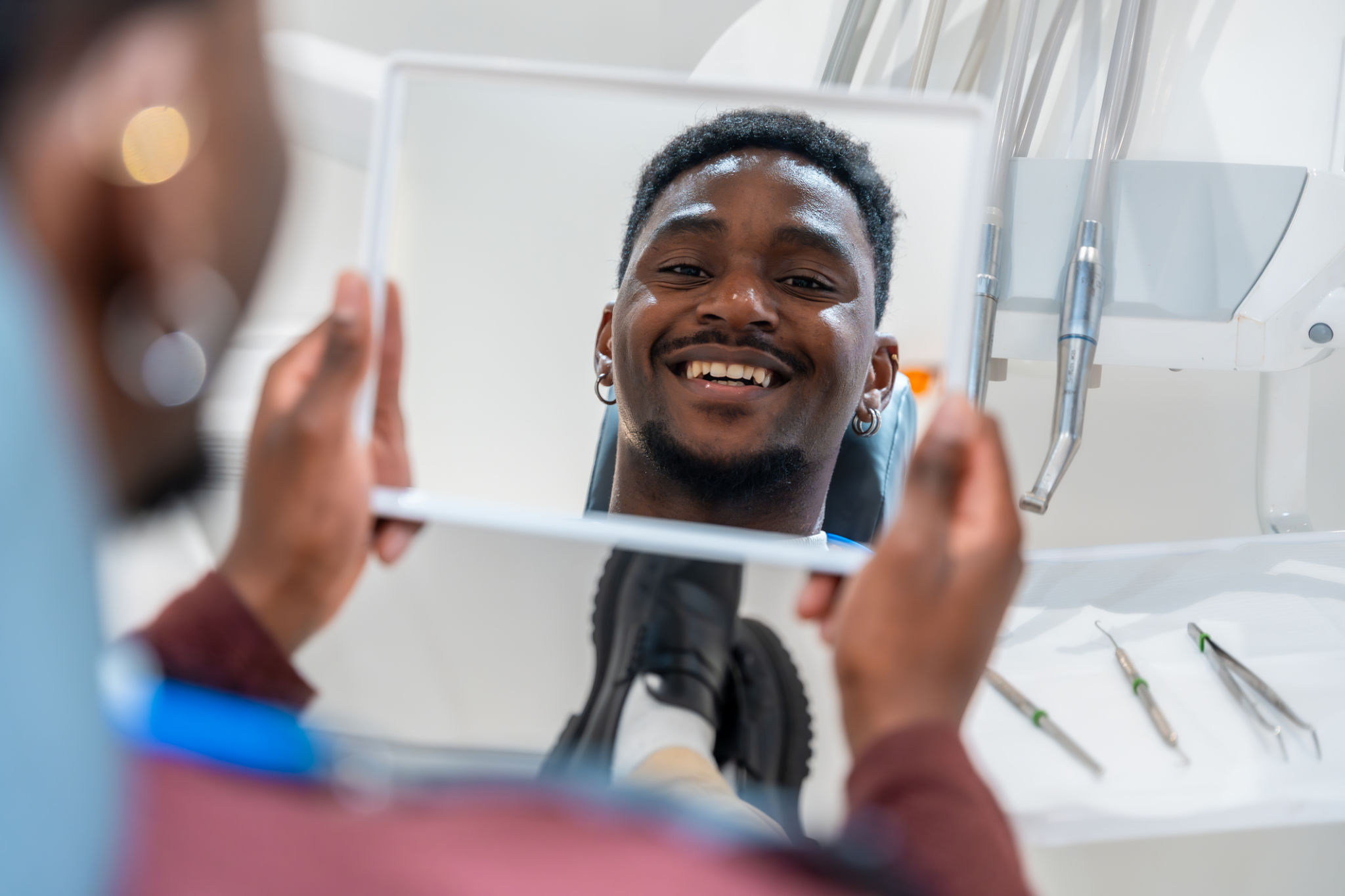 happy patient with straight teeth