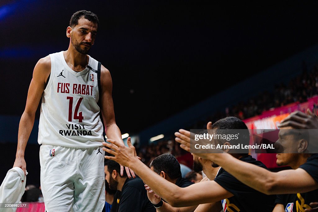 Basketball Rabay Peter Olisemeka of the Rivers Hoopers Basketball Club high fives ...