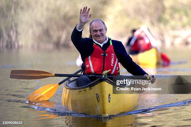 Liberal Democrat leader Ed Davey shares a canoe with local MP Helen Morgan while canoeing with councillors on the local election campaign during a...