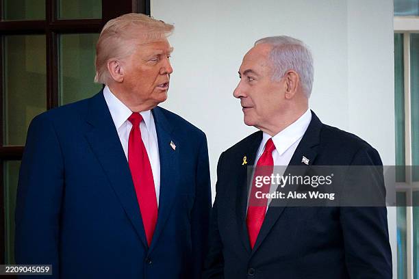 President Donald Trump greets Israeli Prime Minister Benjamin Netanyahu as he arrives at the White House on April 07, 2025 in Washington, DC....