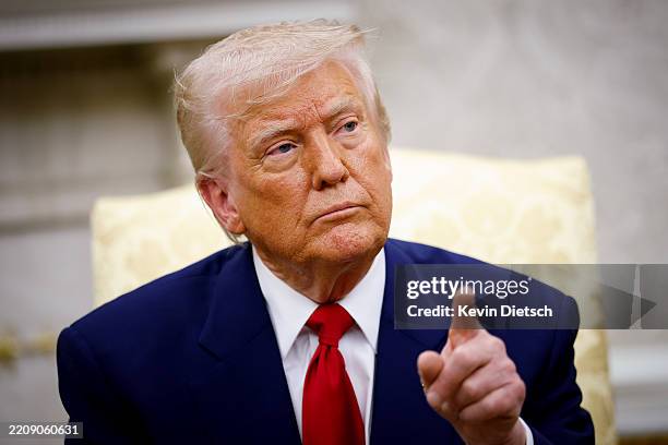 President Donald Trump takes a question from a member of the media during a meeting with Israeli Prime Minister Benjamin Netanyahu in the Oval Office...