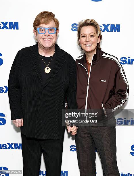 Elton John and Brandi Carlile visit SiriusXM's 'The Howard Stern Show' at SiriusXM Studios on April 07, 2025 in New York City.