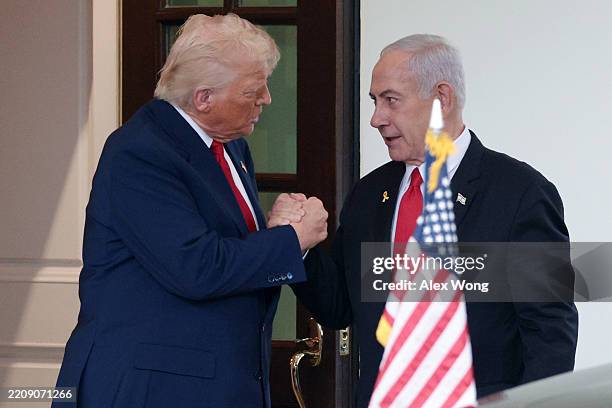 President Donald Trump bids farewell to Israeli Prime Minister Benjamin Netanyahu as he leaves the White House after a meeting on April 07, 2025 in...