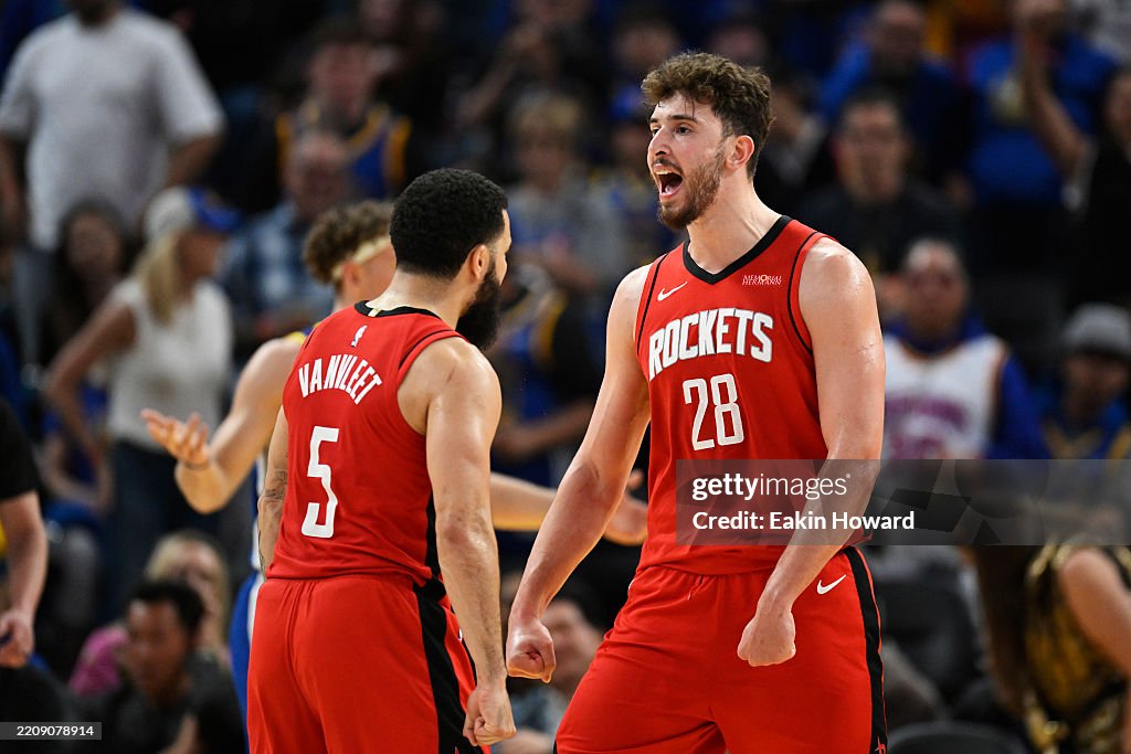 Sanguen Rockets Alperen Sengun of the Houston Rockets celebrates with Fred VanVleet ...