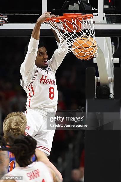 Mylik Wilson of the Houston Cougars dunks the ball during the first half in the National Championship of the NCAA Men's Basketball Tournament against...