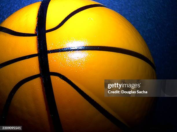 basketball closeup background on black - college basketball tournament stock pictures, royalty-free photos & images
