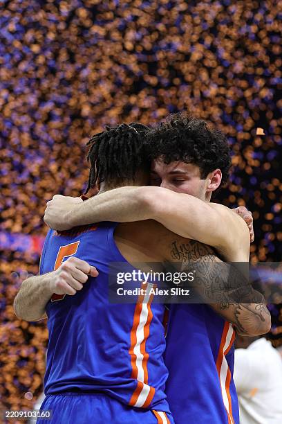 Will Richard of the Florida Gators celebrates with Cooper Josefsberg after the second half in the National Championship of the NCAA Men's Basketball...