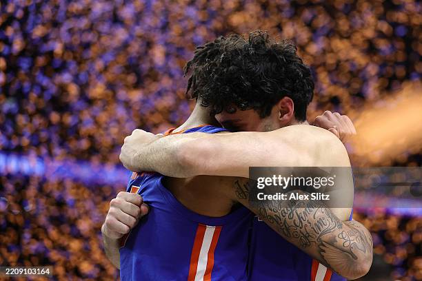 Will Richard of the Florida Gators celebrates with Cooper Josefsberg after the second half in the National Championship of the NCAA Men's Basketball...
