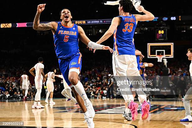 Will Richard of the Florida Gators celebrates a win during the NCAA Men's Basketball National Championship game at Alamodome on April 07, 2025 in San...
