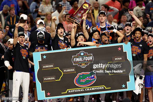 The Florida Gators celebrate after defeating the Houston Cougars in the National Championship of the NCAA Men's Basketball Tournament at the...
