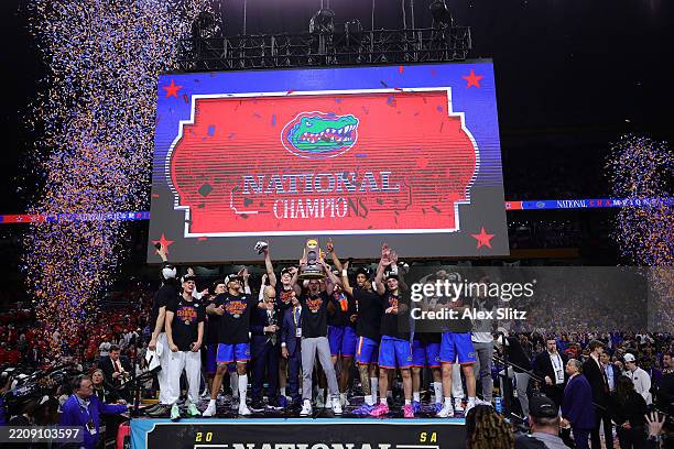 The Florida Gators celebrate after defeating the Houston Cougars in the National Championship of the NCAA Men's Basketball Tournament at the...
