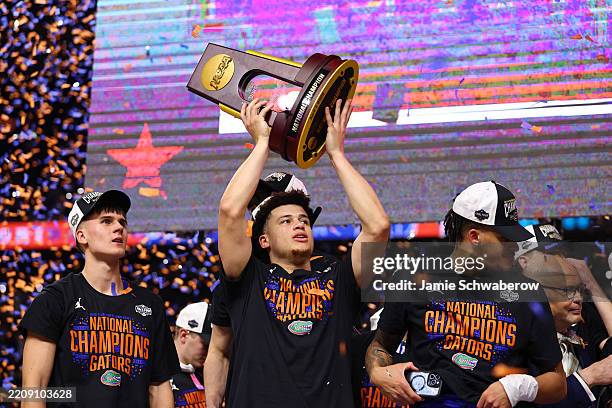 Walter Clayton Jr. #1 of the Florida Gators celebrate a win during the NCAA Men's Basketball National Championship game at Alamodome on April 07,...