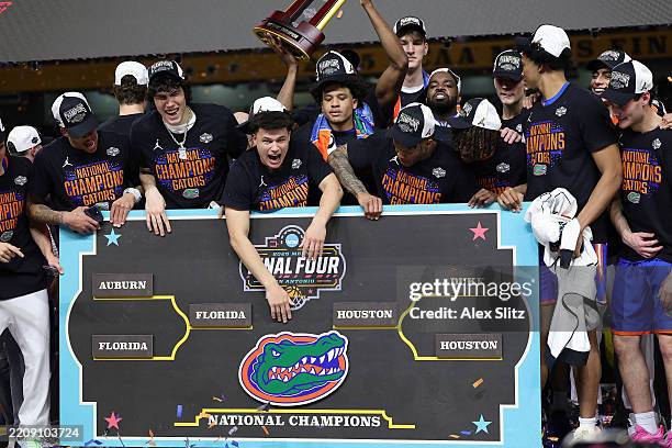 The Florida Gators celebrate after defeating the Houston Cougars in the National Championship of the NCAA Men's Basketball Tournament at the...