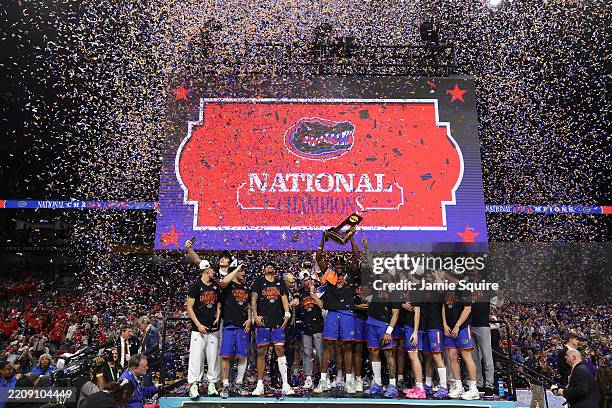 The Florida Gators celebrate after defeating the Houston Cougars in the National Championship of the NCAA Men's Basketball Tournament at the...