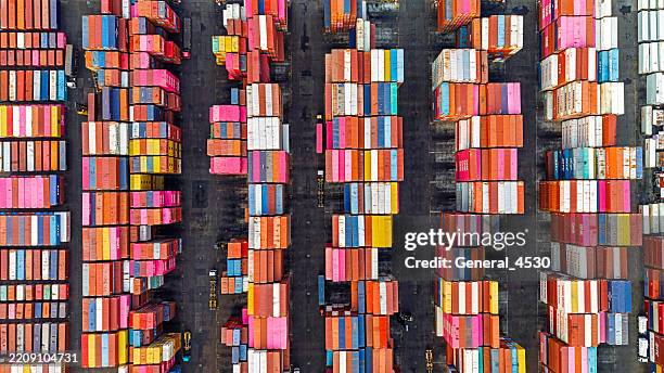 aerial top view container box in warehouse in shipping port. - shipping container top view - fotografias e filmes do acervo